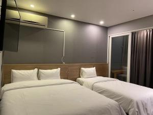 Phòng Deluxe 2 giường cho 3 người - Không hút thuốc (Deluxe Twin Room for 3 People - Non-Smoking)