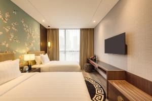 Phòng Hai Giường Đơn Loại Sang (Deluxe Twin Room)
