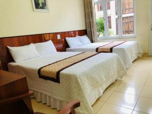 Phòng Bốn Người Có Phòng Tắm Riêng (Quadruple Room with Private Bathroom)