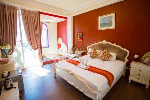 Phòng Deluxe Giường Đôi Với Ban Công và Tầm Nhìn Ra Biển (Deluxe Double Room with Balcony and Sea View)