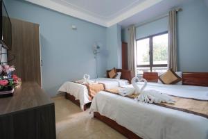 Phòng Hai Giường Đơn Loại Sang (Deluxe Twin Room)