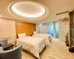 Phòng Hai Giường Đơn Loại Sang (Deluxe Twin Room)
