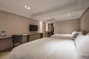 Phòng Deluxe 4 người (Deluxe Quadruple Room)