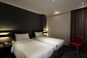 Phòng Hai Giường Đơn Loại Sang (Deluxe Twin Room)