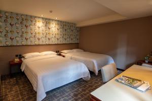 Phòng Hai Giường Đơn Loại Sang (Deluxe Twin Room)