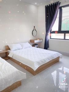 Phòng Bốn Người Có Phòng Tắm Riêng (Quadruple Room with Private Bathroom)