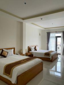 Phòng 4 Người Có Ban Công (Quadruple Room with Balcony)