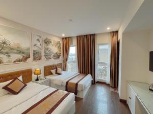 Phòng Superior Đôi có 2 Giường Đôi (Superior Double Room with Two Double Beds)