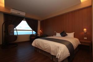 Phòng Có Giường Cỡ Queen Nhìn Ra Biển (Queen Room with Sea View)