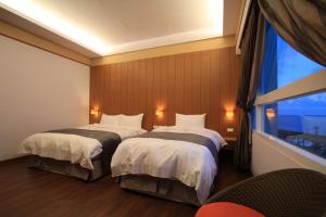 Phòng Deluxe 3 Người Nhìn Ra Biển (Deluxe Triple Room with Sea View)