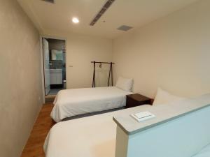Phòng Cơ bản cho 3 người với phòng tắm dùng chung (Basic Triple Room with Shared Bathroom)