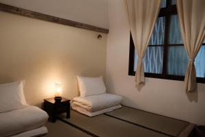 Phòng Giường Đôi Có Phòng Tắm Riêng (Double Room with Private Bathroom)