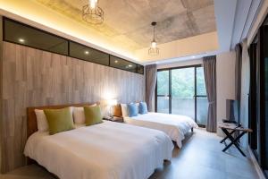 Phòng Bốn Người Hướng Vườn (Garden View Quadruple Room)