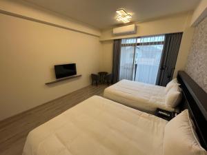 Phòng 4 Người Có Ban Công (Quadruple Room with Balcony)