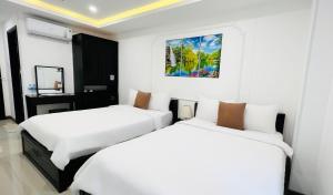 Phòng Hai Giường Đơn Loại Sang (Deluxe Twin Room)