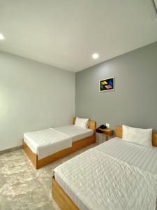 Phòng Hai Giường Đơn Loại Sang (Deluxe Twin Room)