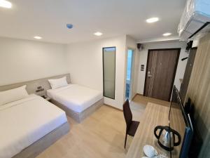 Phòng Hai Giường Đơn có Phòng Tắm (Twin Room with Bathroom)