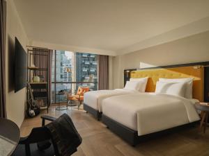 Phòng Hai Giường Đơn Loại Sang (Deluxe Twin Room)
