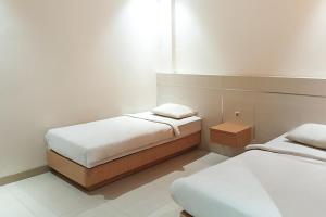 Phòng Hai Giường Đơn Loại Sang (Deluxe Twin Room)
