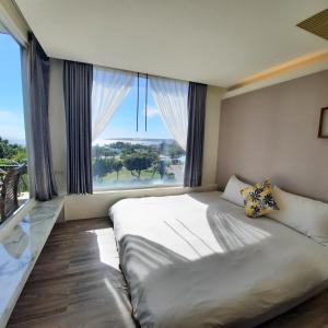 Phòng 4 người có Ban công và Nhìn ra Biển (Quadruple Room with balcony and Sea View)