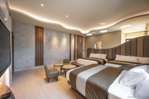 Suite Gia Đình Deluxe (Deluxe Family Suite)