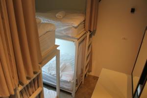 Giường trong Phòng ngủ tập thể cả Nam và Nữ 4 Người (Bed in 4-Bed Mixed Dormitory Room)
