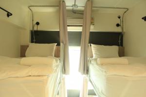 Giường trong Phòng ngủ tập thể cả Nam và Nữ 4 Người (Bed in 4-Bed Mixed Dormitory Room)