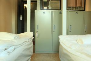 Giường trong Phòng ngủ tập thể cả Nam và Nữ 4 Người (Bed in 4-Bed Mixed Dormitory Room)
