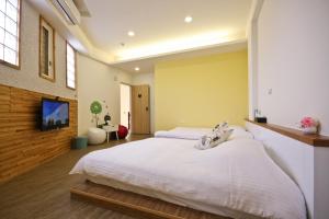 Phòng Hai Giường Đơn Bốn Người (Quadruple Twin Room)