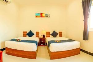 Phòng Hai Giường Đơn Loại Sang (Deluxe Twin Room)