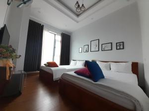 Phòng Tiêu Chuẩn Có 2 Giường Cỡ Queen (Standard Queen Room with Two Queen Beds)