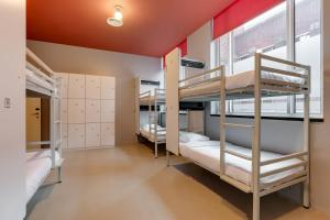 Bed in 6-bed en-suite dorm room in ClinkNOORD Hostel