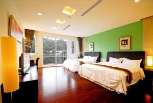 Phòng Deluxe 4 Người (Deluxe Quadruple Room)