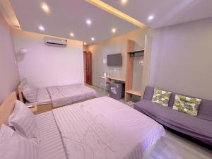 Phòng Deluxe 4 Người (Deluxe Quadruple Room)