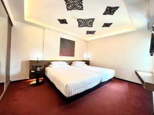 Phòng Hai Giường Đơn Loại Sang (Deluxe Twin Room)