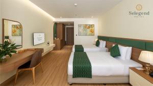 Phòng Hai Giường Đơn Loại Sang (Deluxe Twin Room)