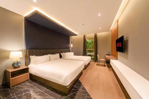 Phòng Hai Giường Đơn Loại Sang (Deluxe Twin Room)