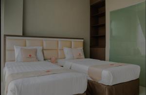 Phòng Hai Giường Đơn Loại Sang (Deluxe Twin Room)