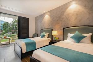 Phòng Hai Giường Đơn Loại Sang (Deluxe Twin Room)