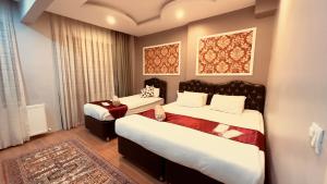 Standard Triple Room room in Mitra Downtown Hotel & Suites