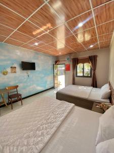 Phòng 4 người nhìn ra vườn (Quadruple Room with Garden View)