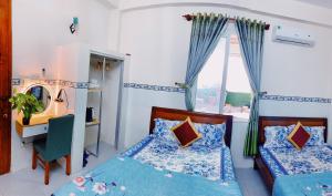 Phòng Tiêu Chuẩn 4 Người (Standard Quadruple Room)