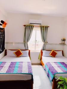 Phòng 4 Người Nhìn Ra Biển (Quadruple Room with Sea View)