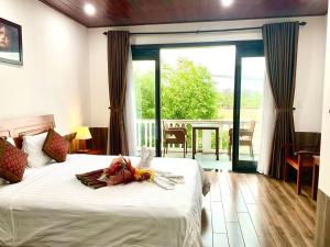 Phòng Deluxe Giường Đôi Nhìn Ra Vườn (Deluxe Double Room with Garden View)