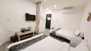 Phòng Bốn Người Có Phòng Tắm Riêng (Quadruple Room with Private Bathroom)