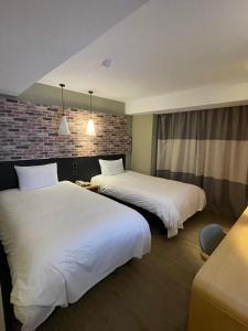 Phòng Hai Giường Đơn Loại Sang (Deluxe Twin Room)