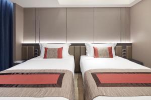 Phòng Đẳng Cấp Hai Giường Đơn (Premier Twin Room)