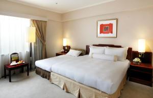 Phòng Deluxe có giường phụ (Deluxe Room with Extra Bed)