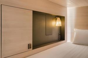 Giường trong Phòng ngủ Tập thể 4 Giường cho cả Nam và Nữ (Bed in 4 Bed Mixed Dormitory)
