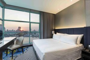 One-Bedroom Suite King with River View  room in Chatrium Hotel Riverside Bangkok